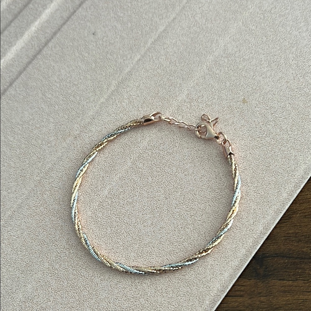Elegant Gold and Silver Braided Bracelet